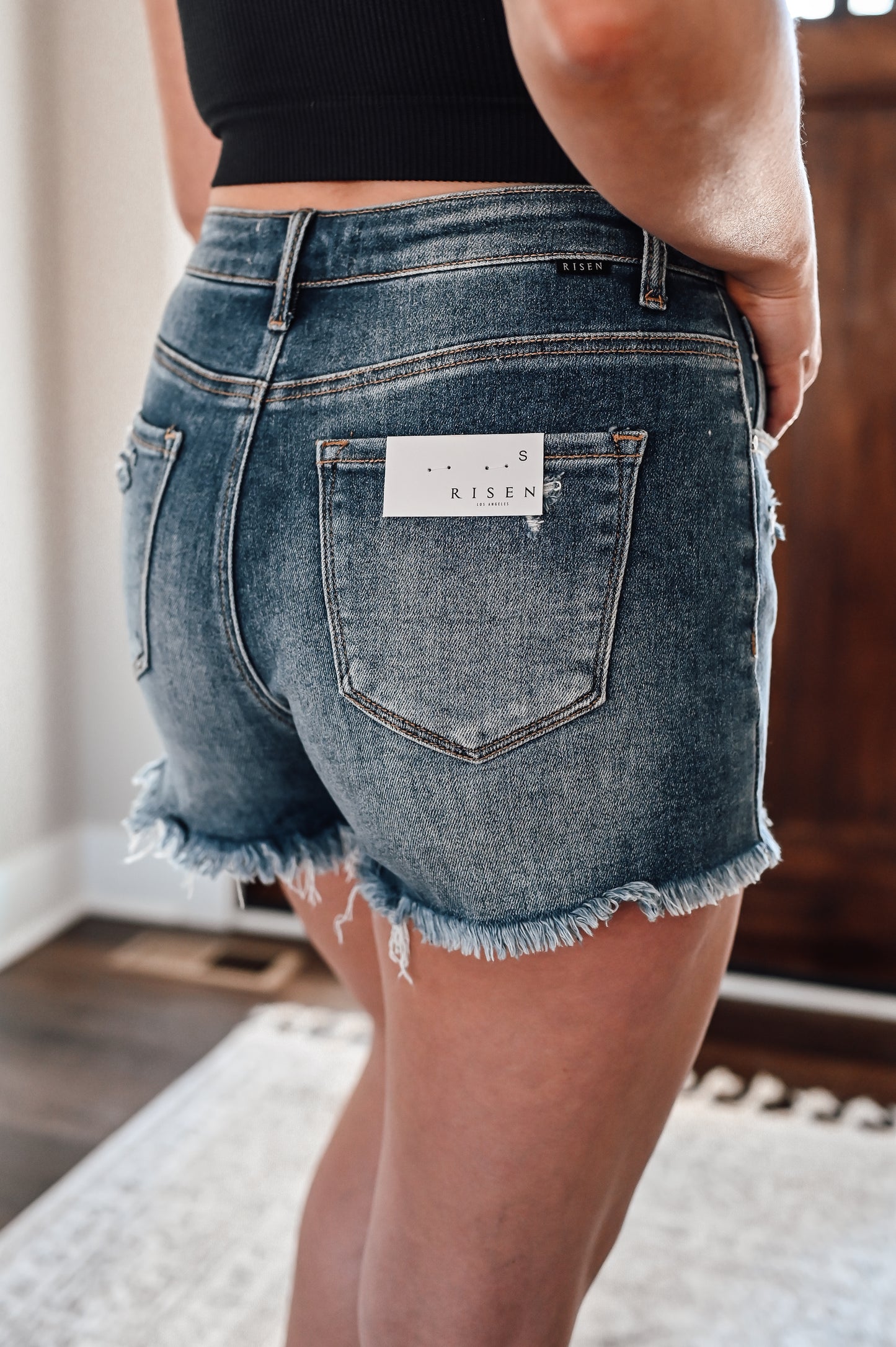 risen-high-rise-denim-shorts