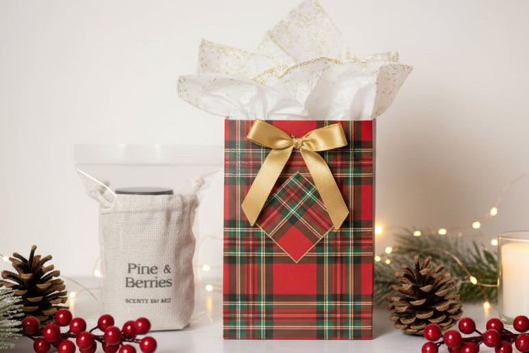 Scented product labeled 'Pine & Berries' with a pine cone and branch on a textured background