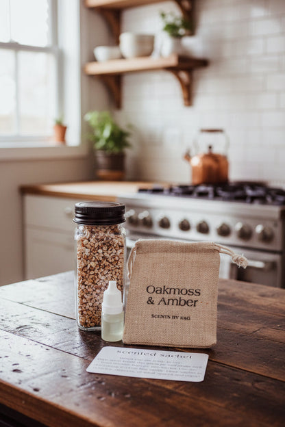 A Scented Sachet kit from Scents by K&G on a rustic countertop in a kitchen with plants and dishes in the background