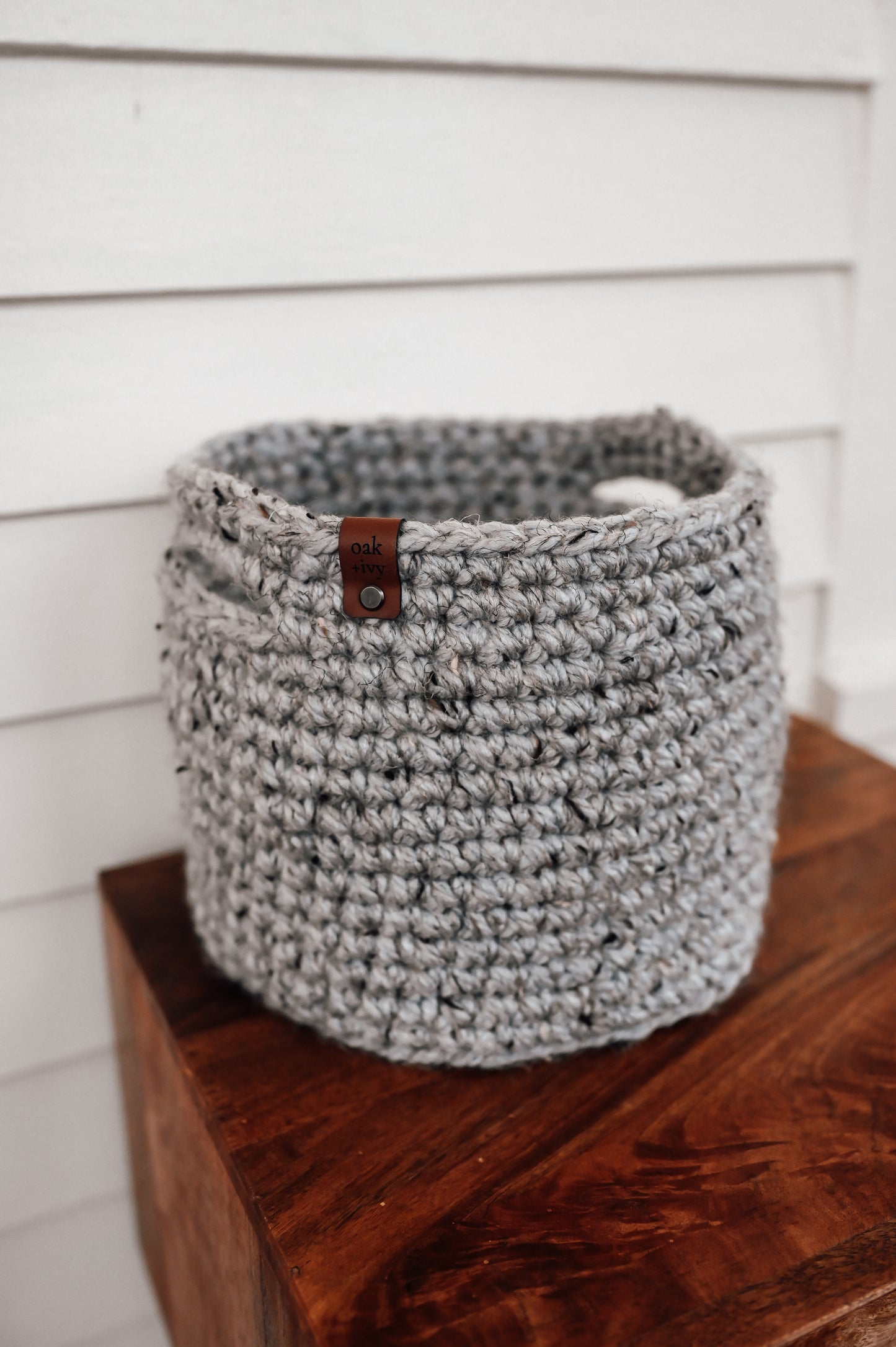 grey-crocheted-basket-with-handles